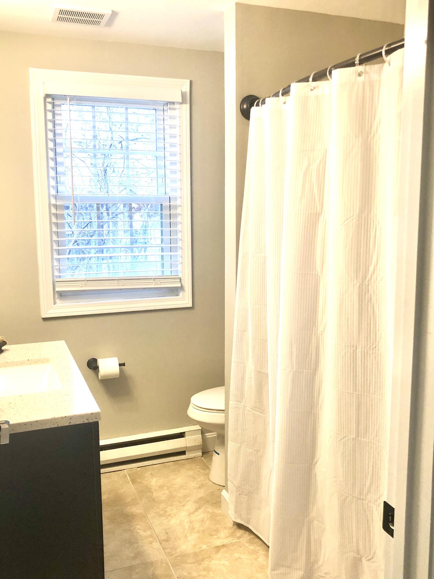 135 West Main Street, Unit 26 Hyannis, MA 02601 - Photo 21 of 29 a bathroom with a sink and a mirror