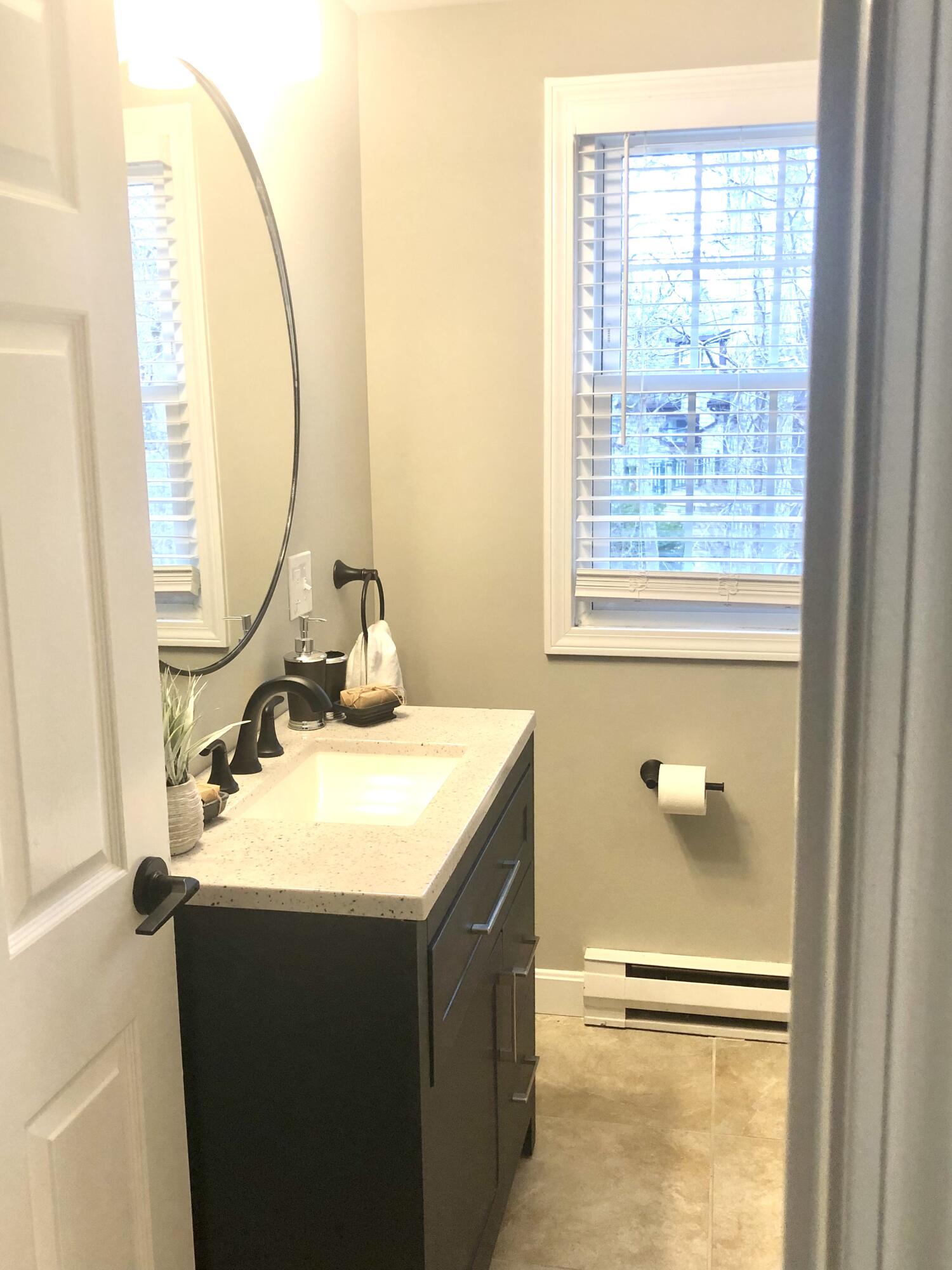 135 West Main Street, Unit 26 Hyannis, MA 02601 - Photo 22 of 29 a bathroom with a sink and a mirror