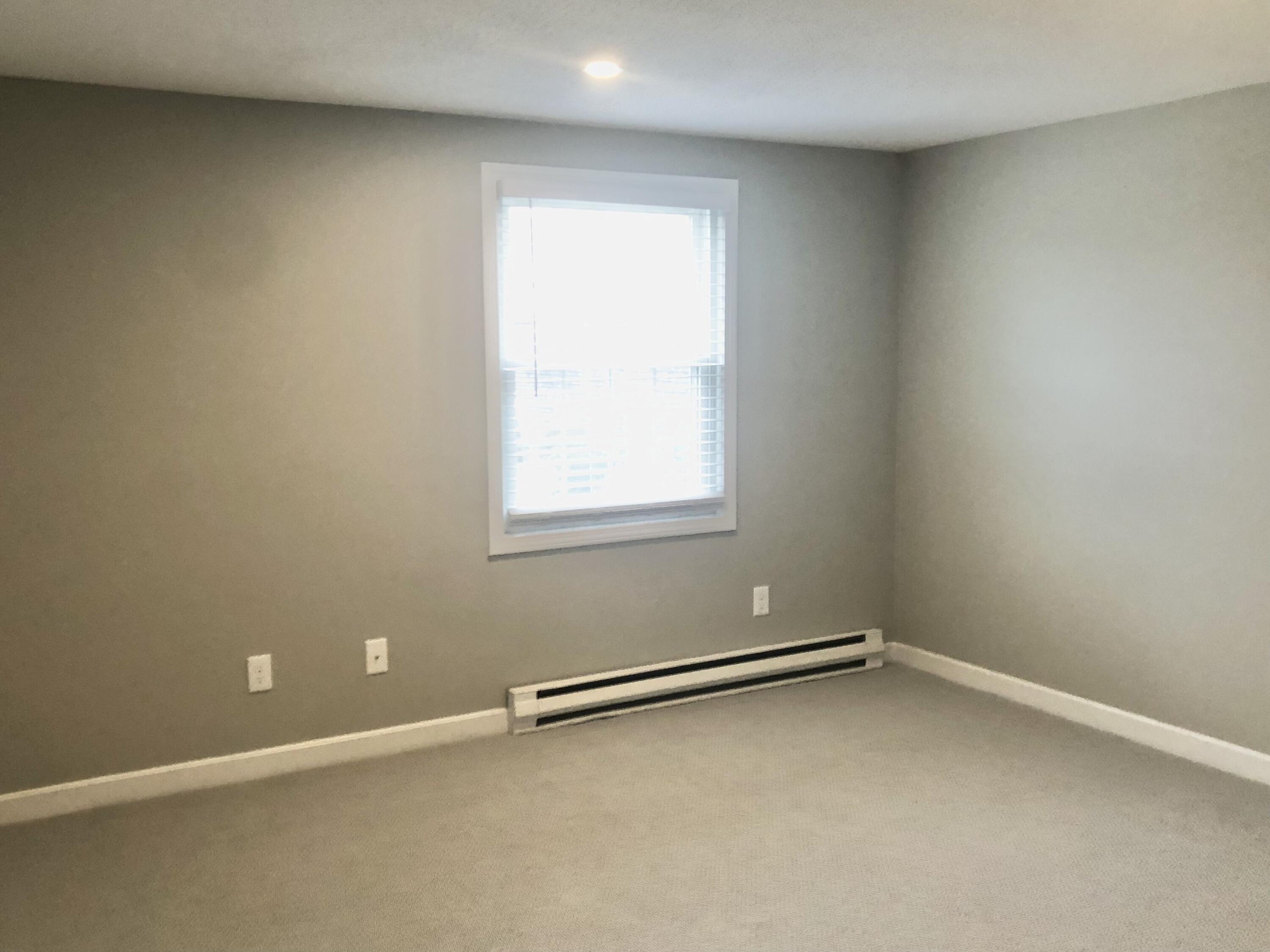 135 West Main Street, Unit 26 Hyannis, MA 02601 - Photo 26 of 29 an empty room with a window