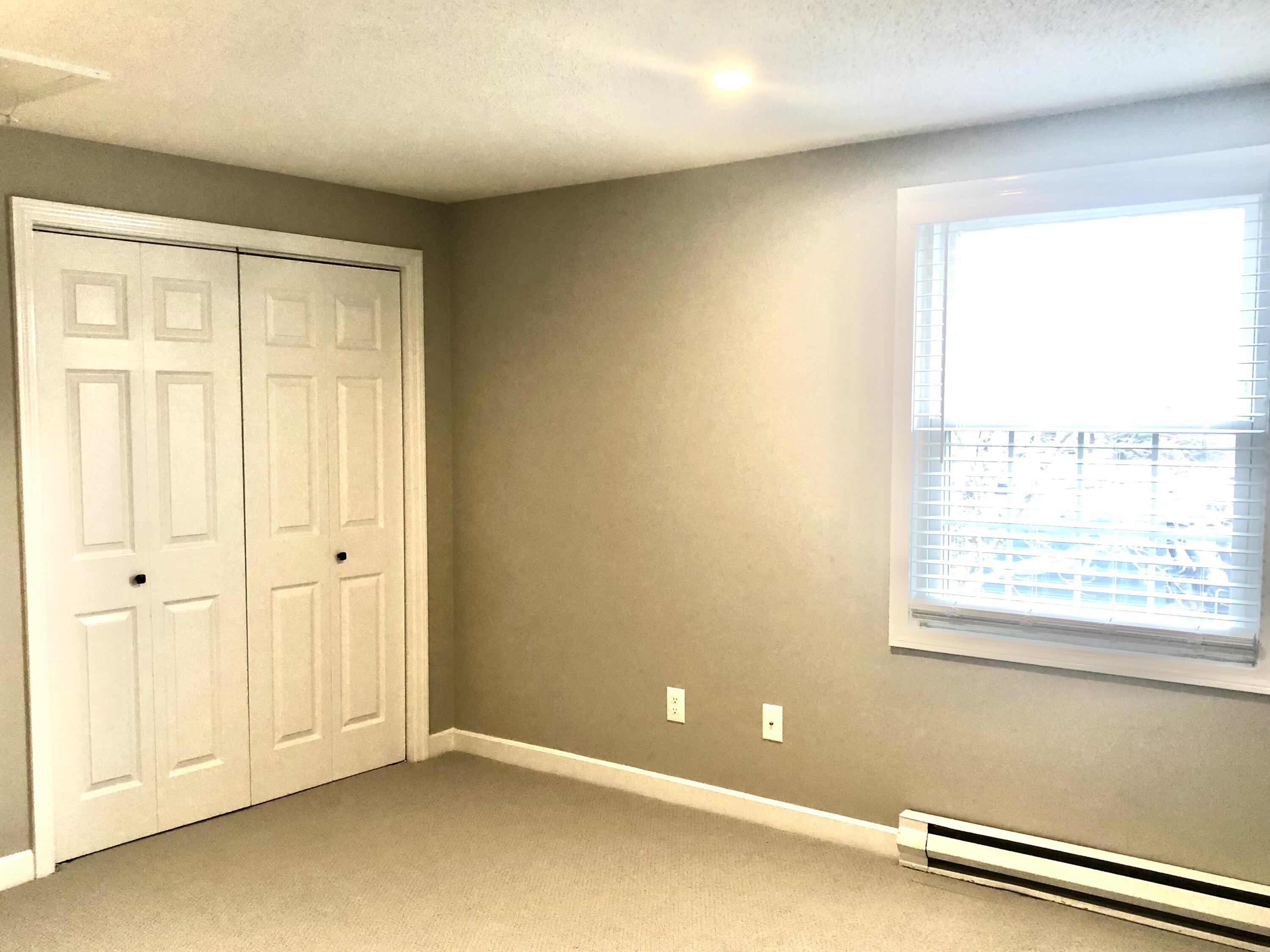 135 West Main Street, Unit 26 Hyannis, MA 02601 - Photo 27 of 29 an empty room with windows