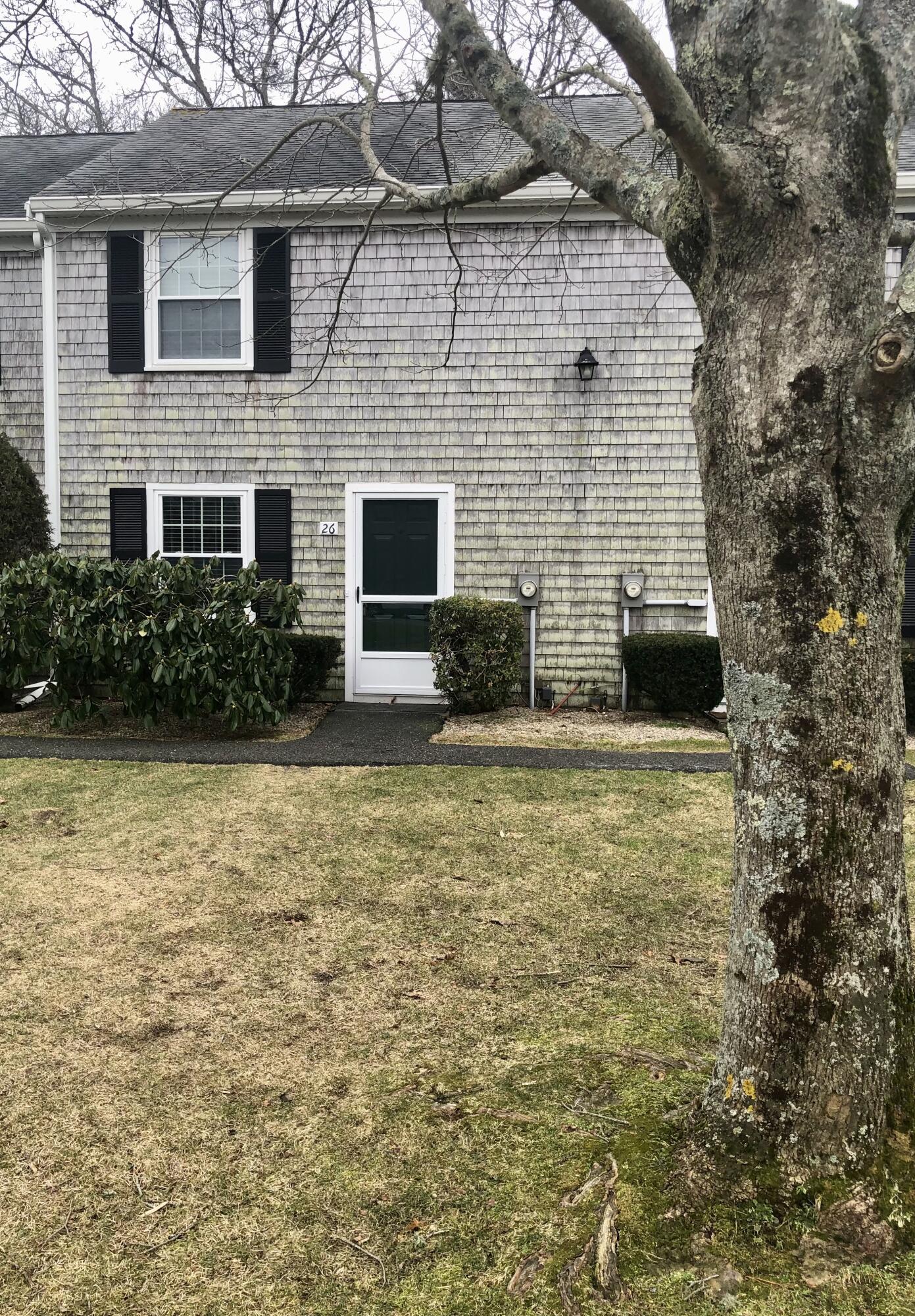 135 West Main Street, Unit 26 Hyannis, MA 02601 - Photo 29 of 29 a view of house with backyard space