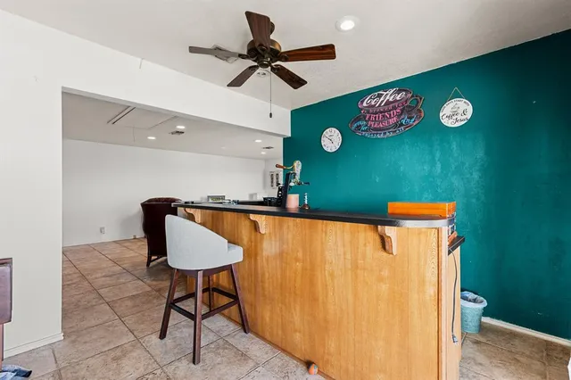 a view of a table and chairs in a room