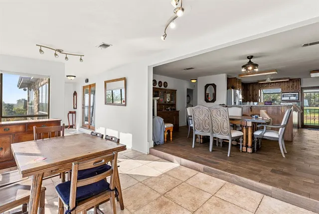 a view of a dining room with furniture