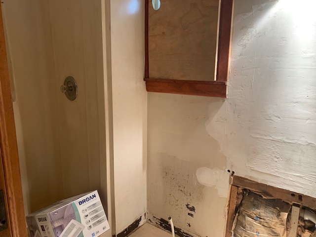 1013 Guion Street Ottawa, IL 61350 - Photo 25 of 26 a bathroom with a sink and a mirror