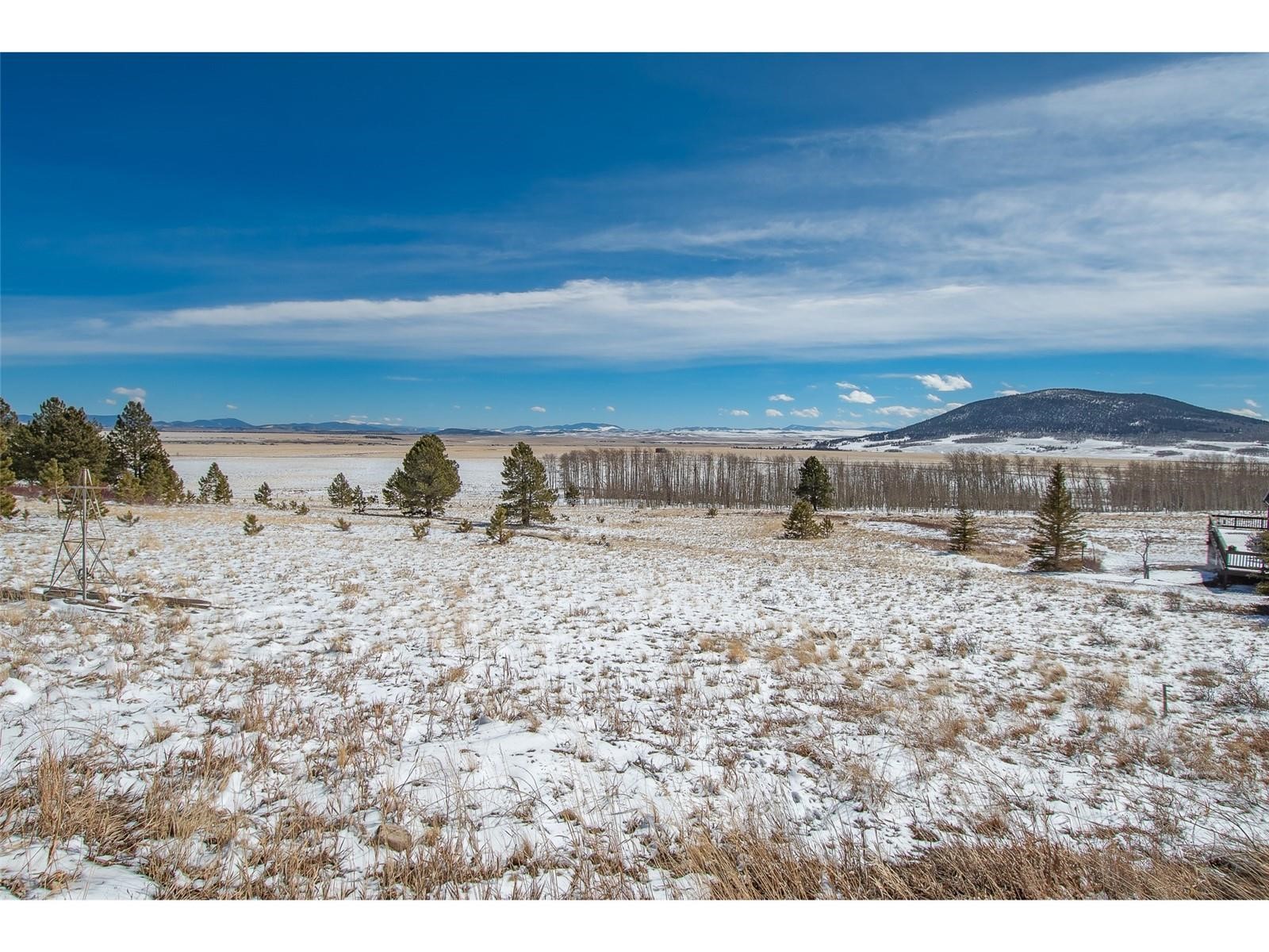 1327 Sheep Ridge Road Fairplay, CO 80440 - Photo 22 of 26 a view of a dry yard with wooden fence