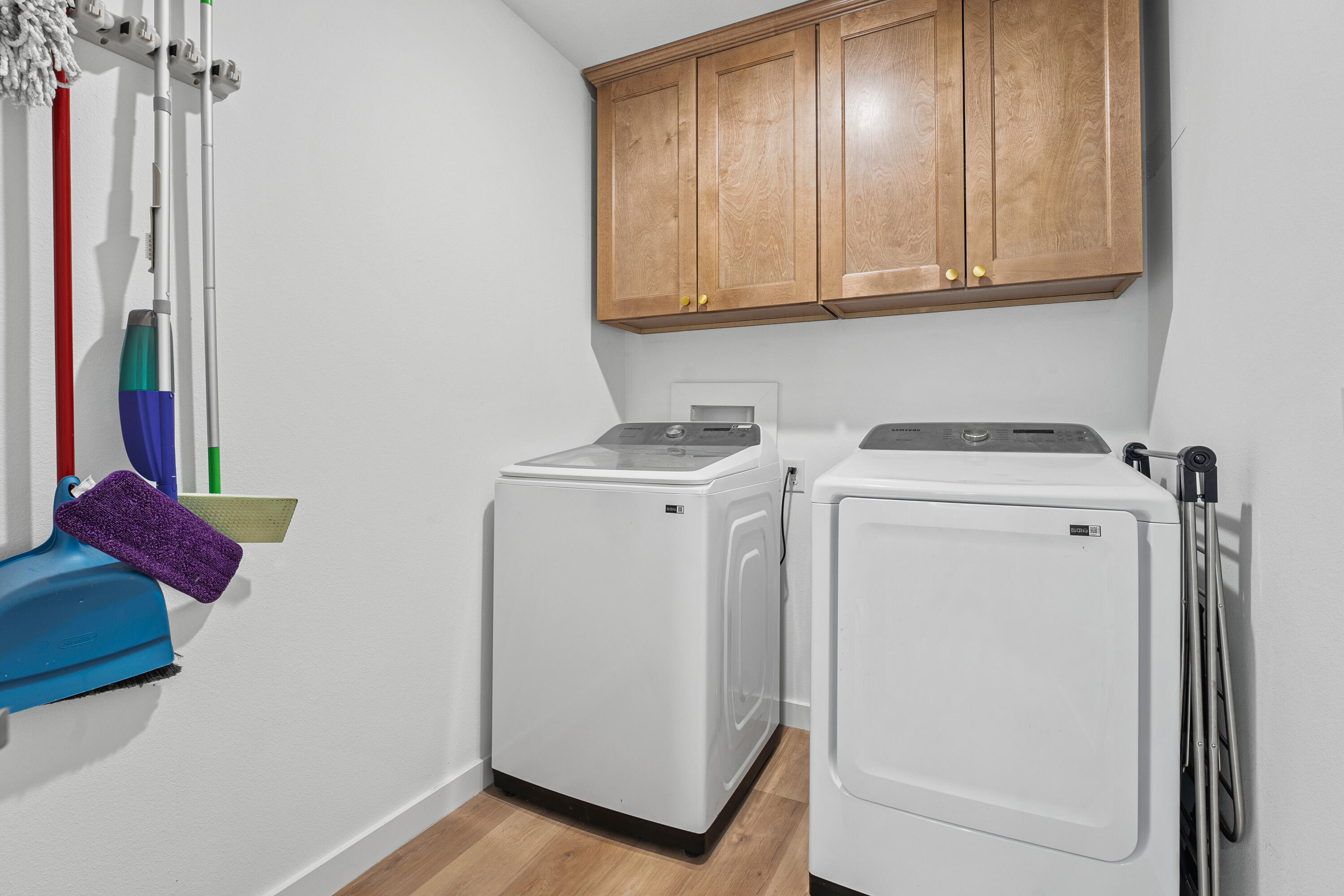 10517 Bangor Avenue Lubbock, TX 79424 - Photo 19 of 27 a view of storage and utility room with washer and dryer