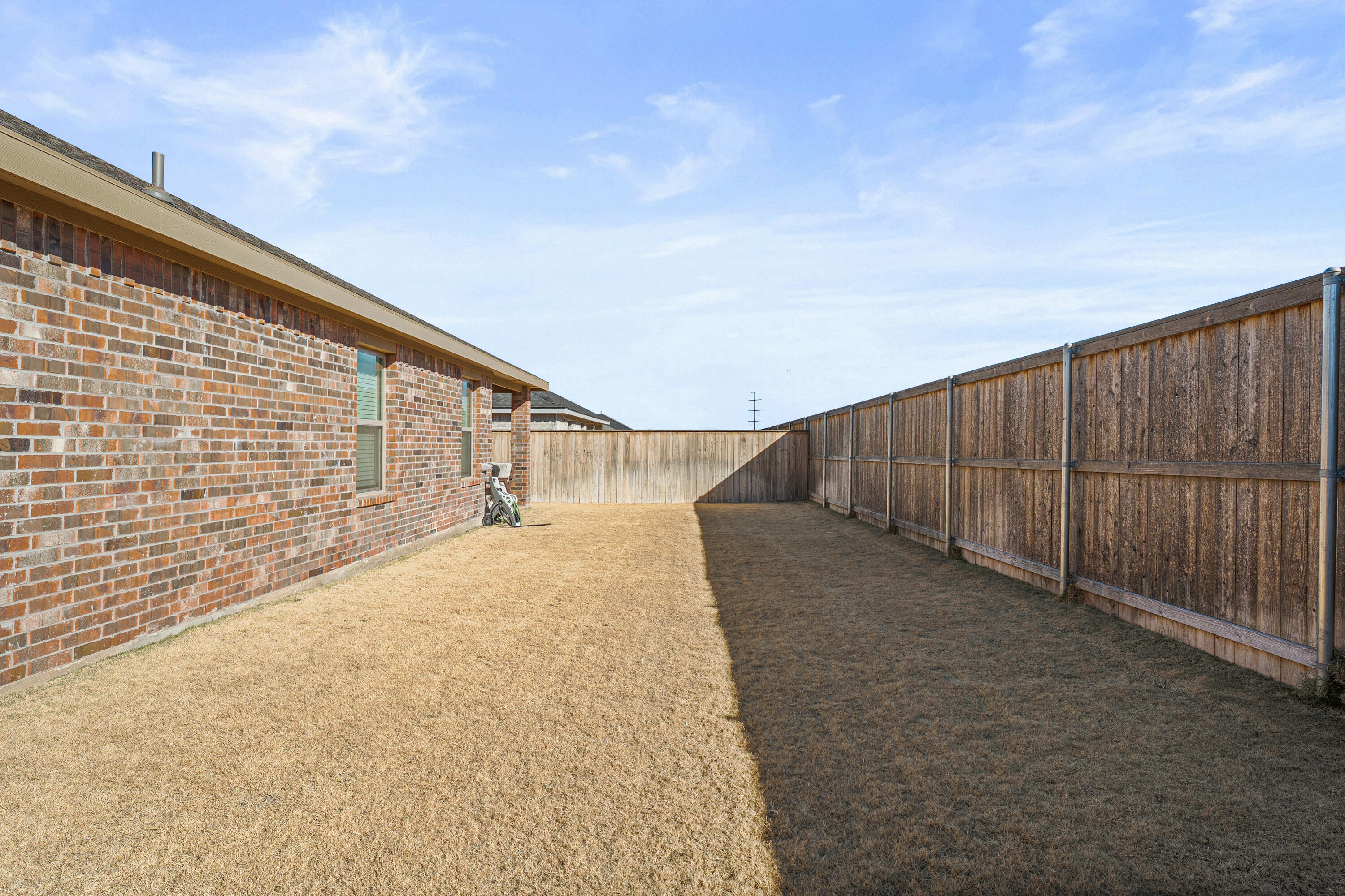 10517 Bangor Avenue Lubbock, TX 79424 - Photo 27 of 27 a view of balcony with wooden floor