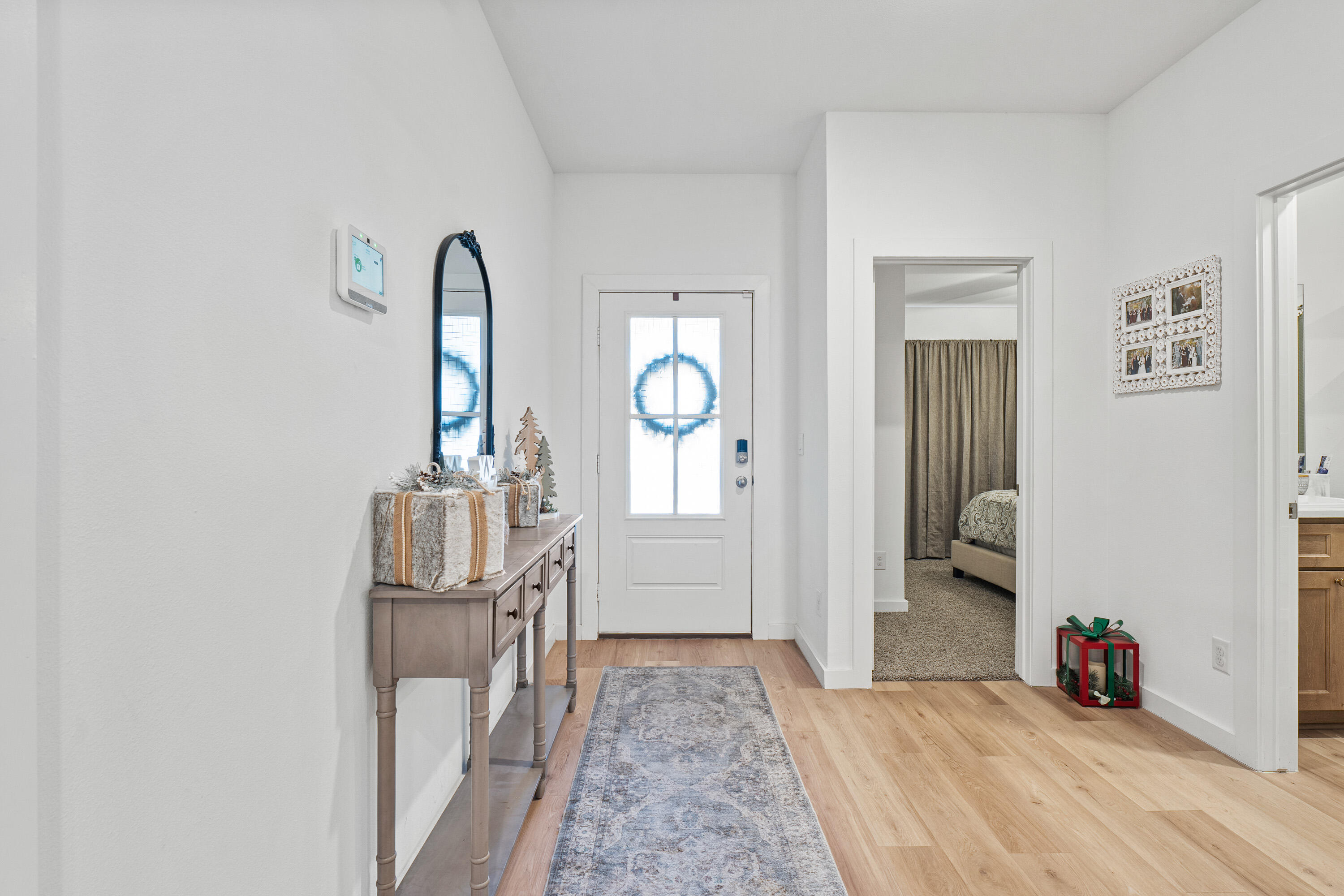 10517 Bangor Avenue Lubbock, TX 79424 - Photo 4 of 27 a view of entryway with wooden floor