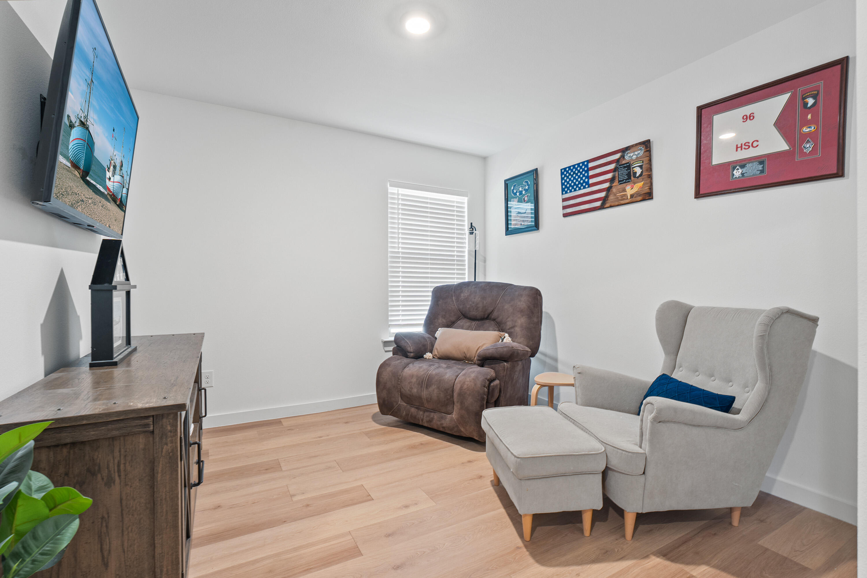 10517 Bangor Avenue Lubbock, TX 79424 - Photo 5 of 27 a living room with furniture and a fireplace