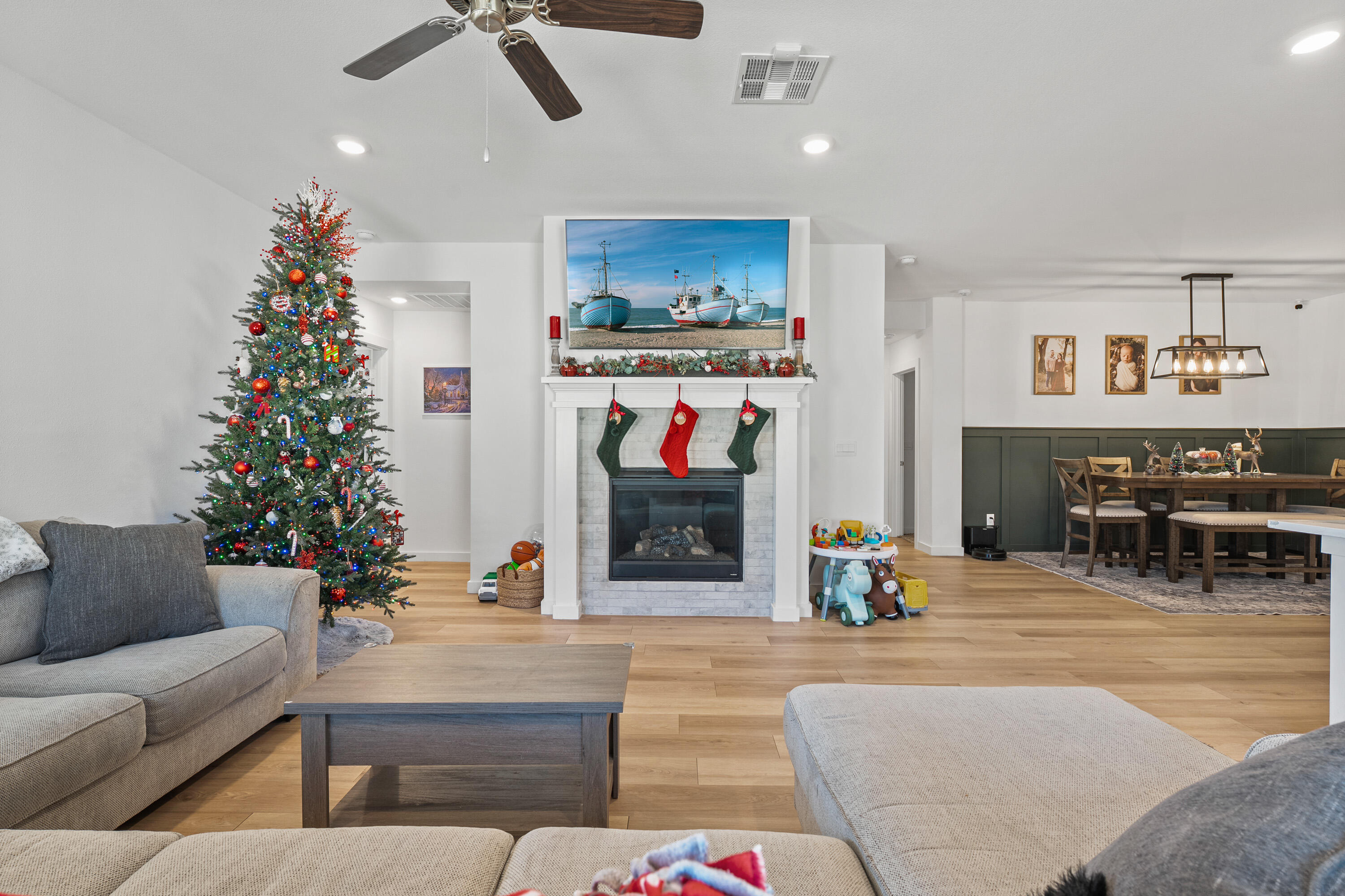 10517 Bangor Avenue Lubbock, TX 79424 - Photo 9 of 27 a living room with furniture and a chandelier