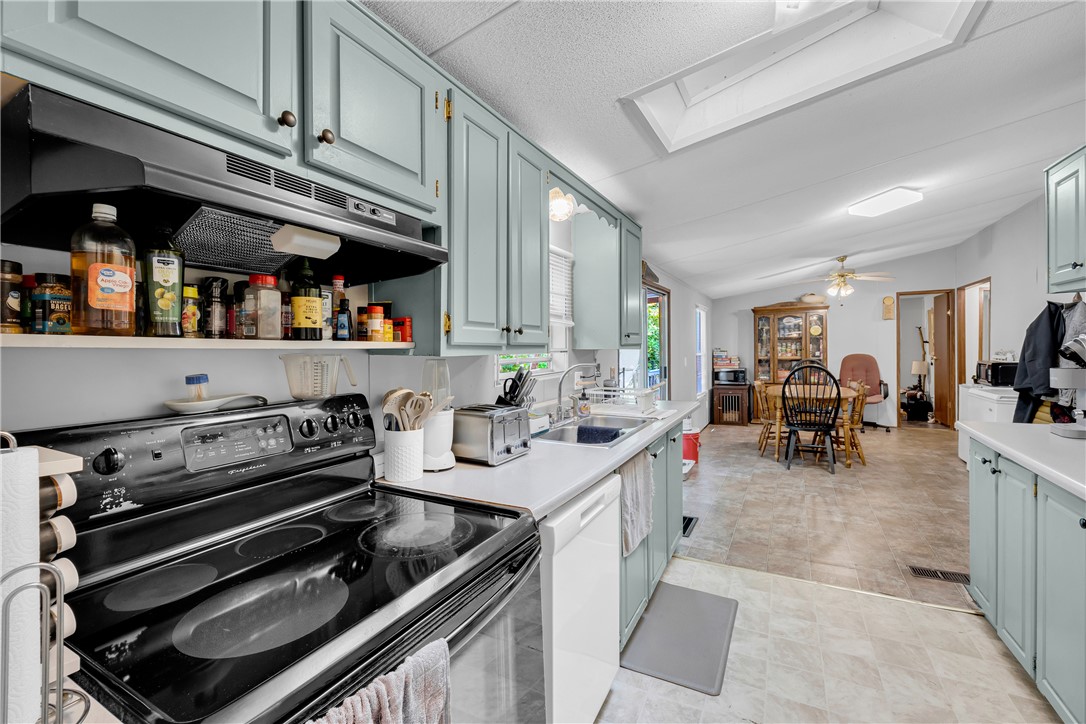 162 Newberry Road Walhalla, SC 29691 - Photo 14 of 50 A streamlined kitchen layout provides efficient meal preparation and seamless interaction with the adjacent dining space.