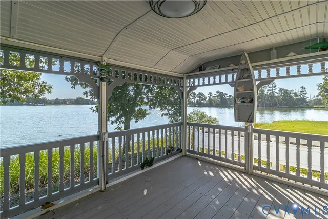 a view of a porch with wooden floor