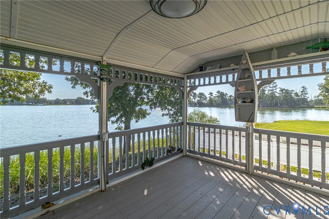 529 Morattico Creek Road Farnham, VA 22460 - Photo 16 of 24 a view of a porch with wooden floor