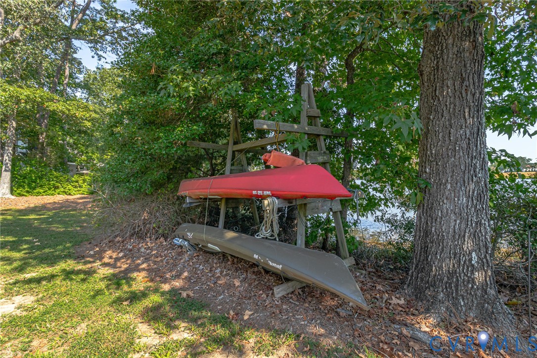 529 Morattico Creek Road Farnham, VA 22460 - Photo 17 of 24 a view of a backyard with a fountain