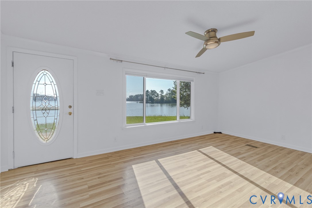 529 Morattico Creek Road Farnham, VA 22460 - Photo 6 of 24 a view of an empty room with window and mirror