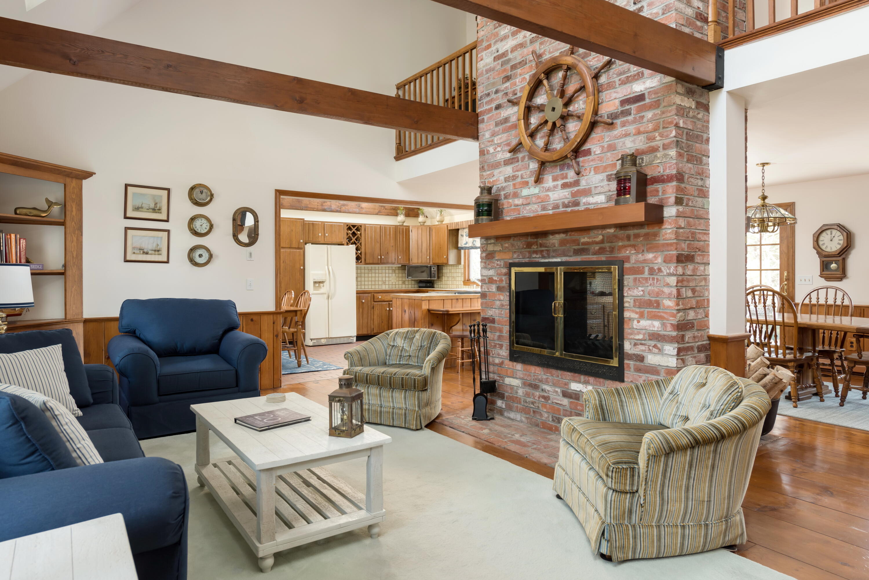 1 Wequasset Road Harwich Port, MA 02646 - Photo 10 of 25 a living room with furniture and a fireplace