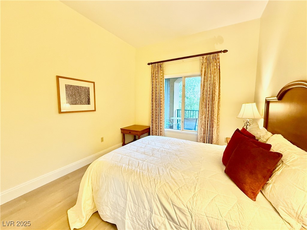 30 Strada Di Villaggio, Unit 204 Henderson, NV 89011 - Photo 33 of 59 Secondary Bedroom w/Queen Bed