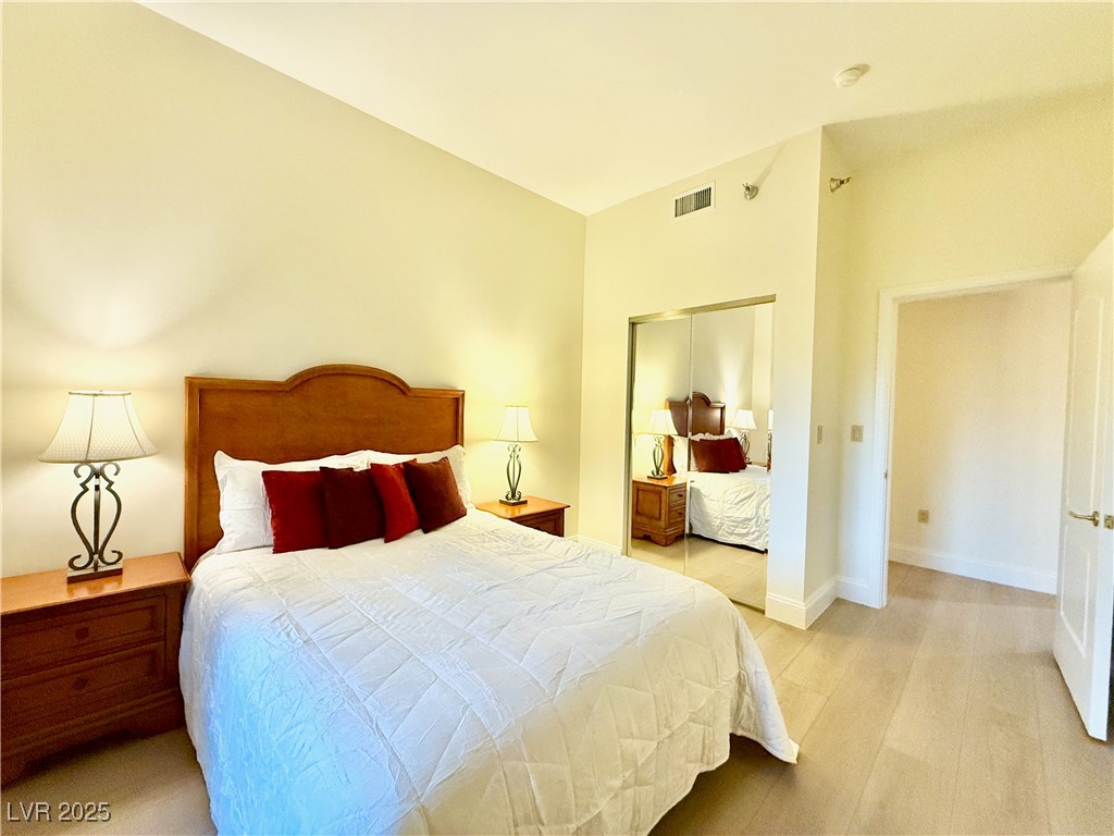 30 Strada Di Villaggio, Unit 204 Henderson, NV 89011 - Photo 34 of 59 Secondary Bedroom w/Queen Bed