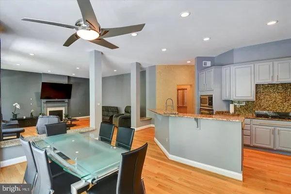 a bedroom with a bed and a flat screen television