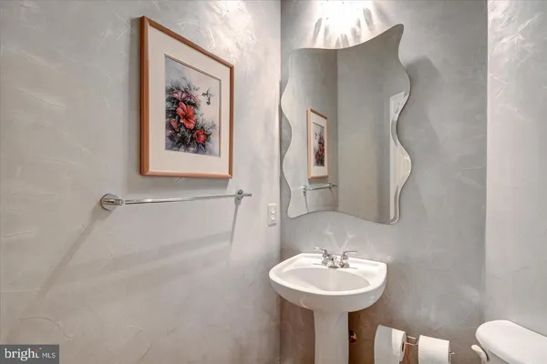 a living room with furniture and large window