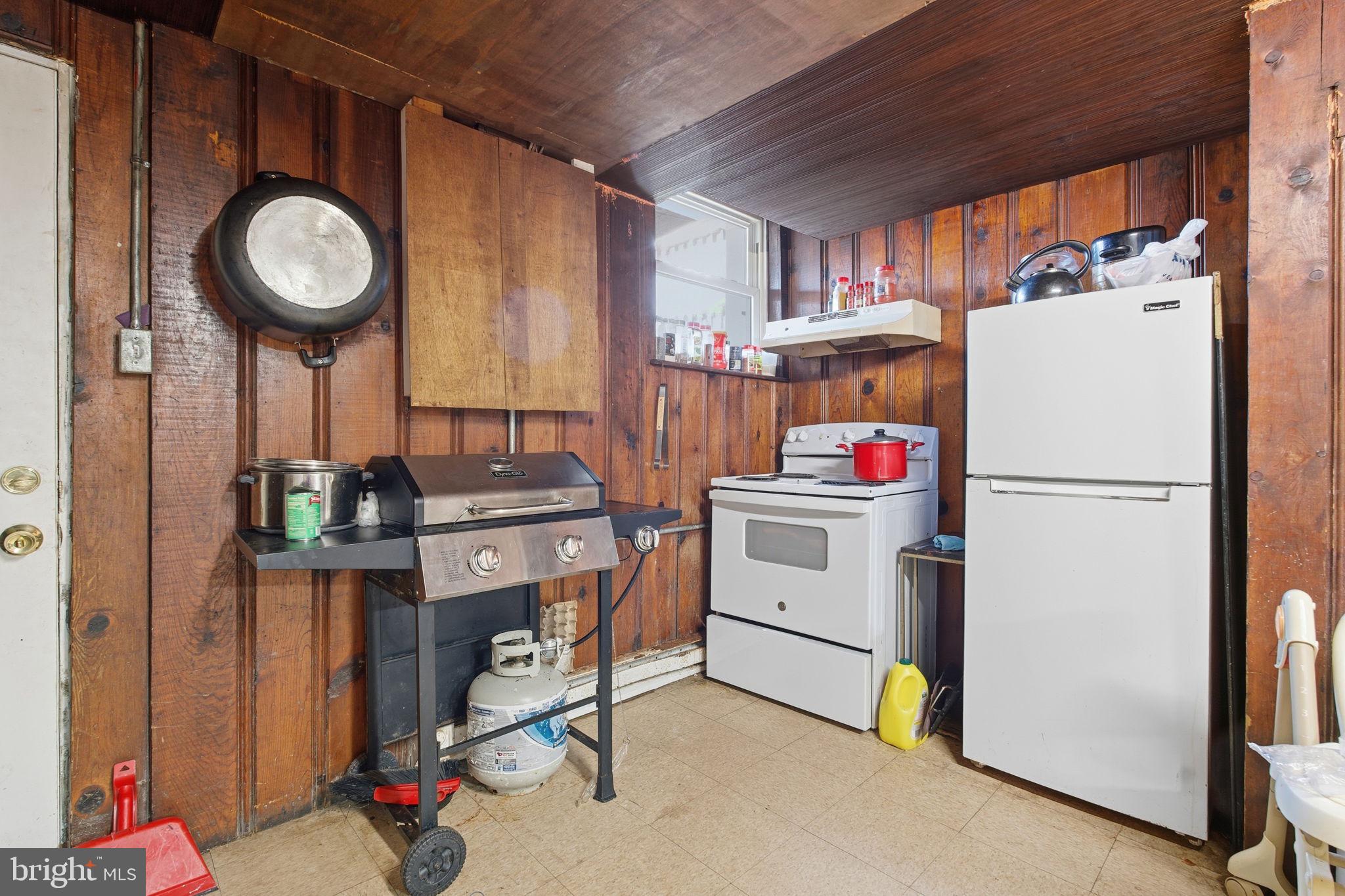 3928 8th Street Baltimore, MD 21225 - Photo 16 of 20 a room with storage and utility