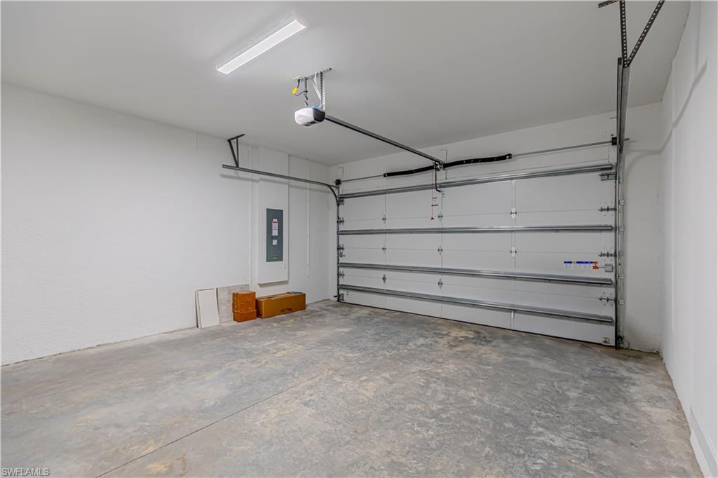 2691 Ridgecrest Place Naples, FL 34112 - Photo 21 of 27 a view of a room with toys and dresser