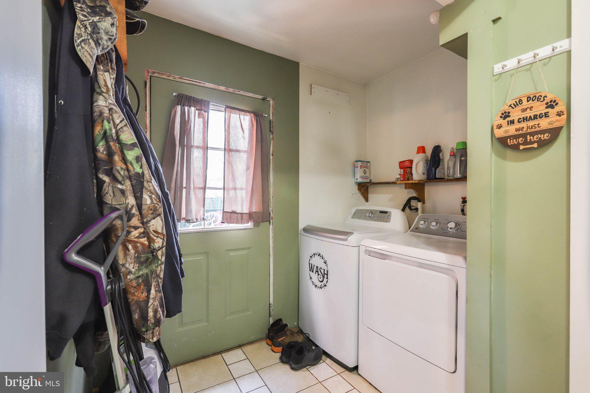 11661 Tanyard Hill Road Orrstown, PA 17244 - Photo 15 of 26 a utility room with dryer and washer