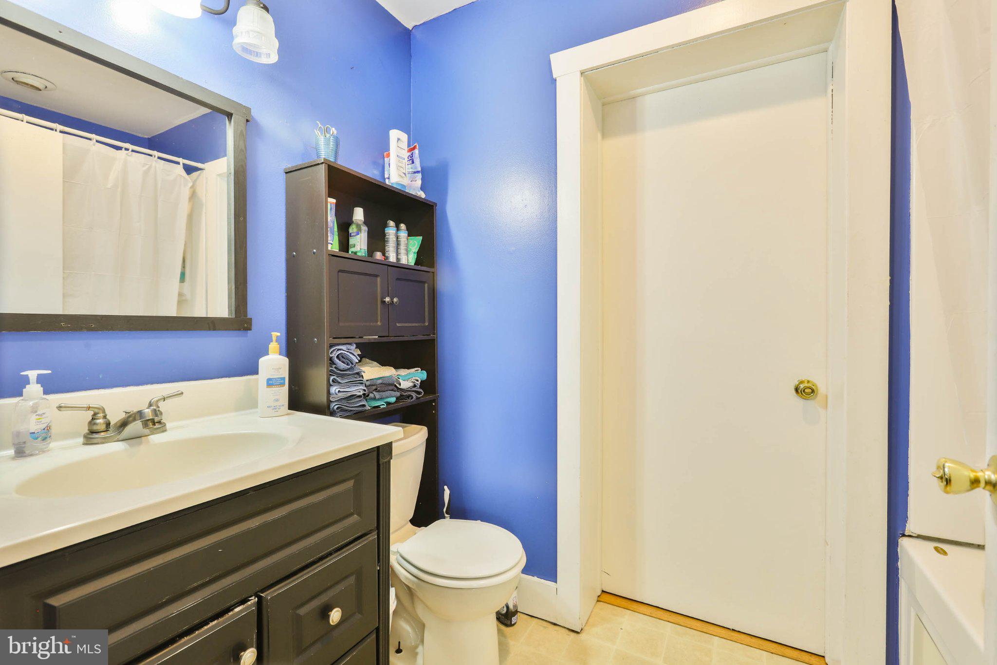 11661 Tanyard Hill Road Orrstown, PA 17244 - Photo 18 of 26 a bathroom with a sink and a mirror