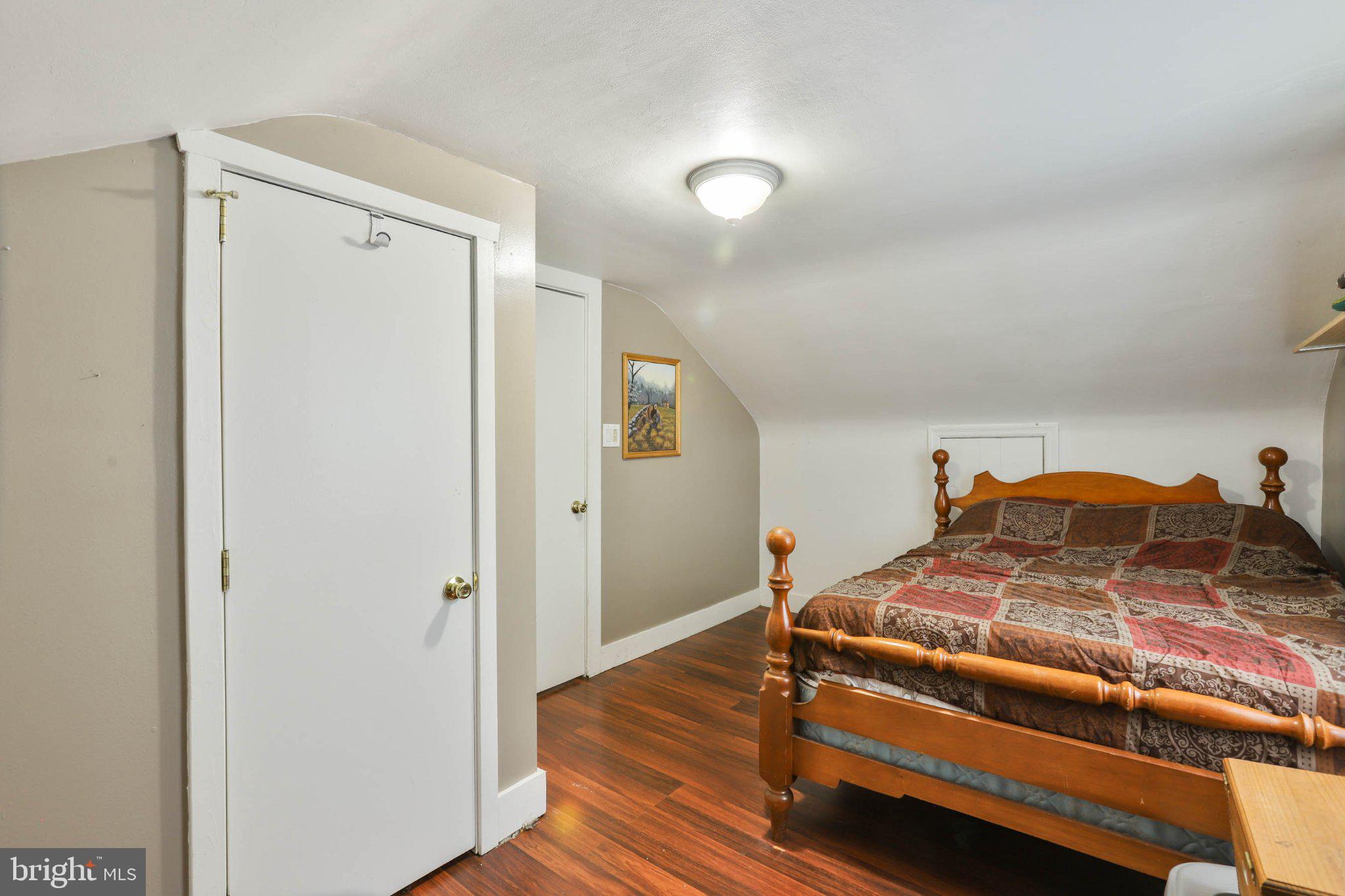 11661 Tanyard Hill Road Orrstown, PA 17244 - Photo 21 of 26 a bedroom with a bed and a dresser