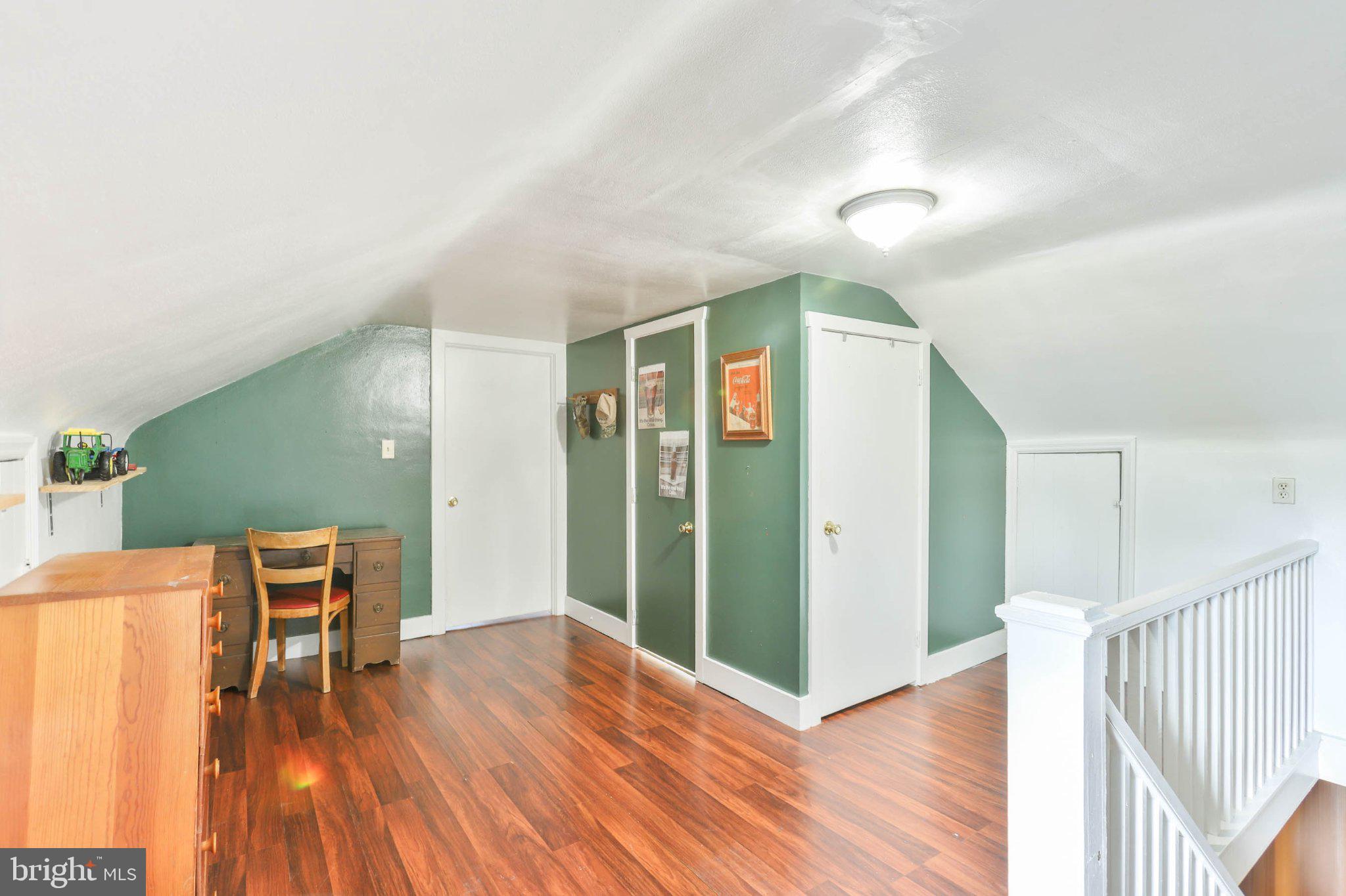 11661 Tanyard Hill Road Orrstown, PA 17244 - Photo 25 of 26 a view of a livingroom with furniture wooden floor and front door