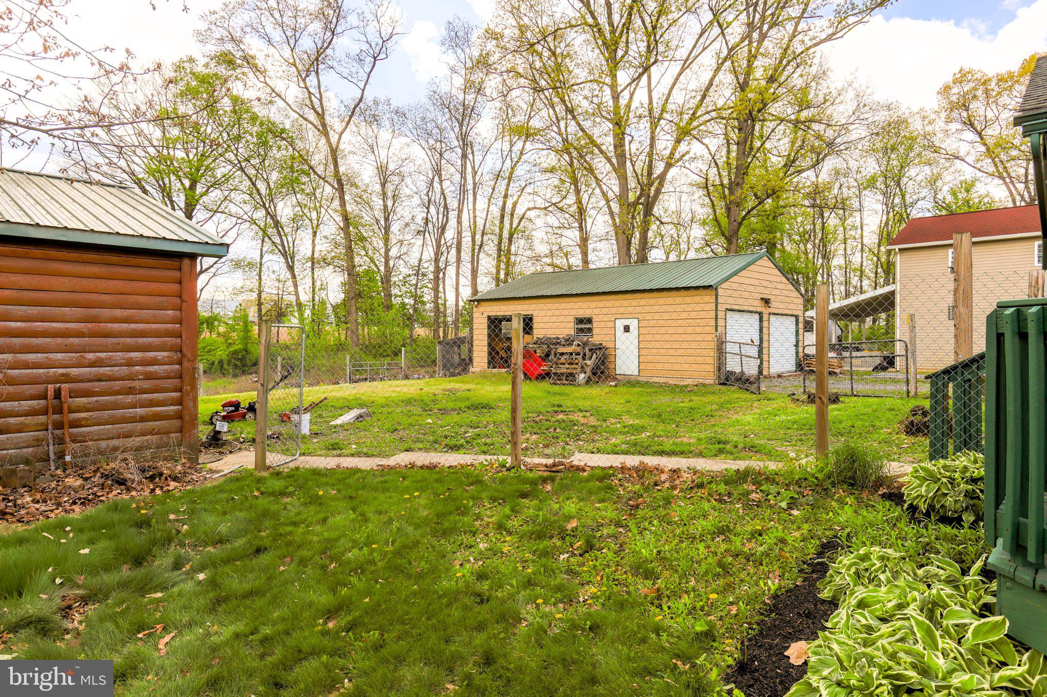 11661 Tanyard Hill Road Orrstown, PA 17244 - Photo 4 of 26 a view of house with backyard