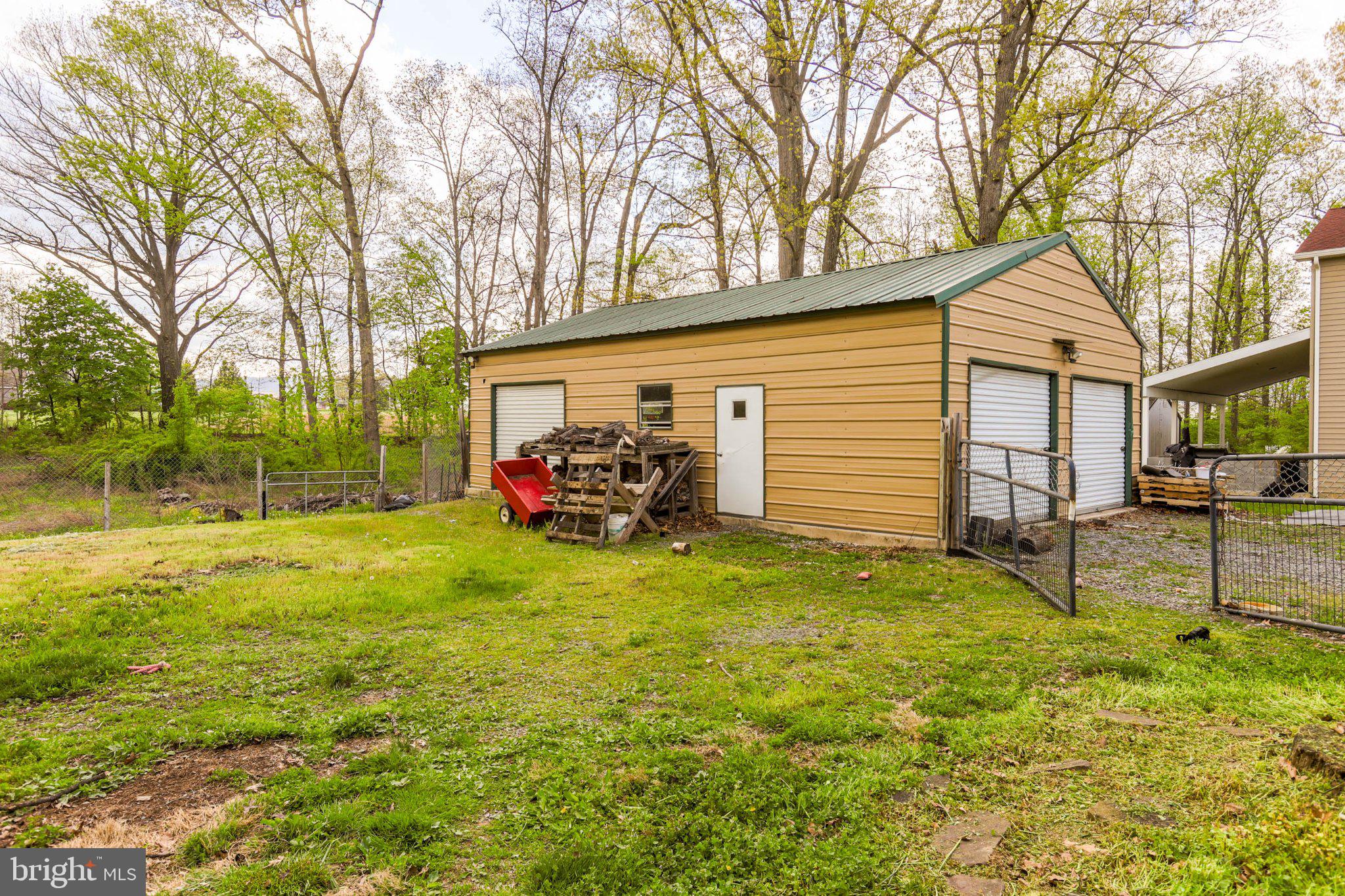 11661 Tanyard Hill Road Orrstown, PA 17244 - Photo 6 of 26 a view of a house with backyard