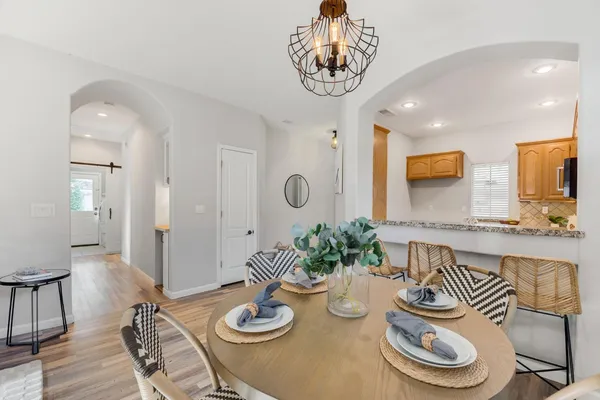 a view of a dining room with furniture