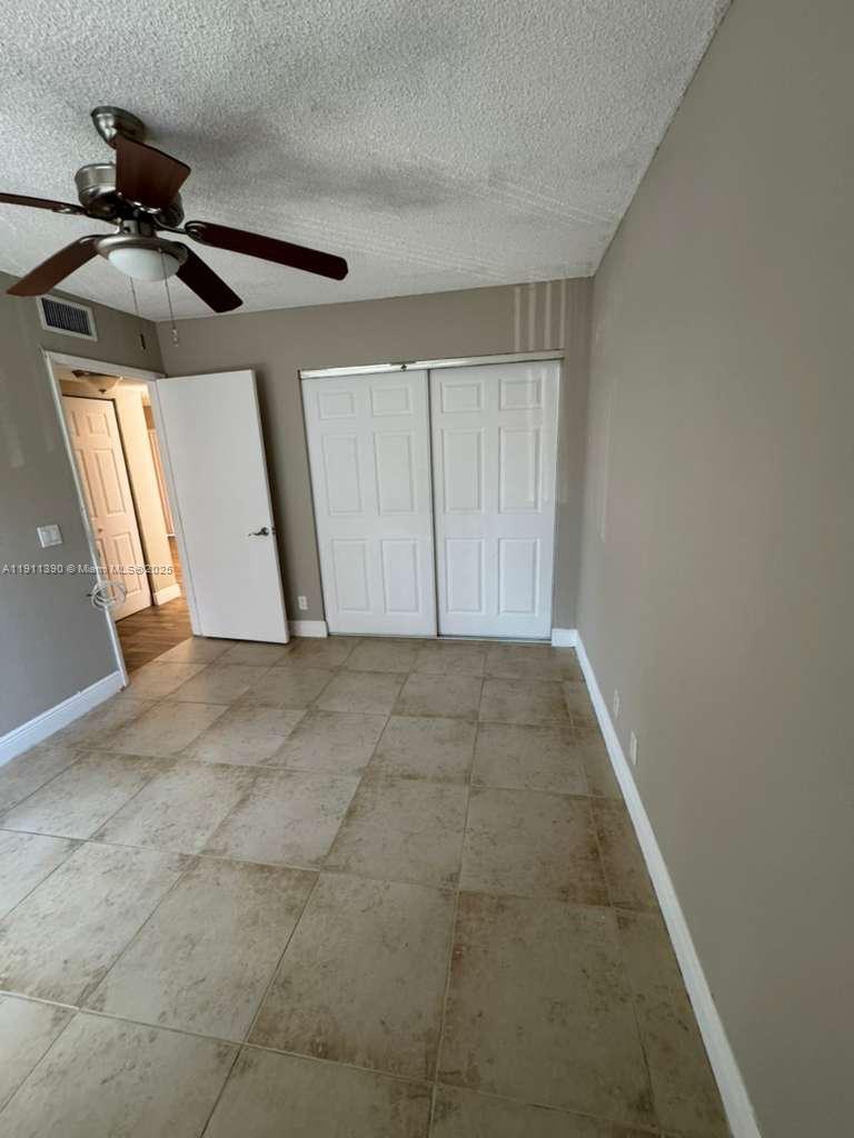 1580 Windorah Way, Unit E West Palm Beach, FL 33411 - Photo 13 of 20 a view of an empty room