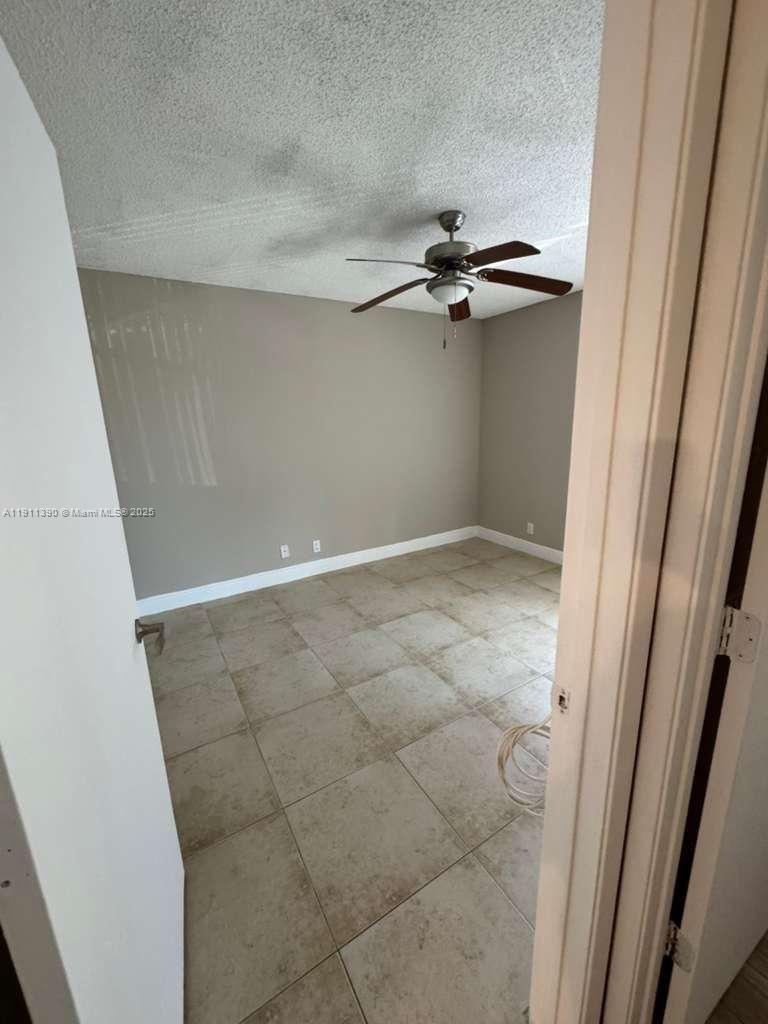 1580 Windorah Way, Unit E West Palm Beach, FL 33411 - Photo 14 of 20 a view of empty room