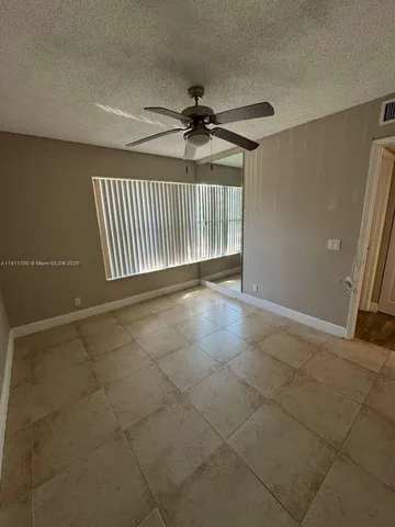 a view of a livingroom with a staircase
