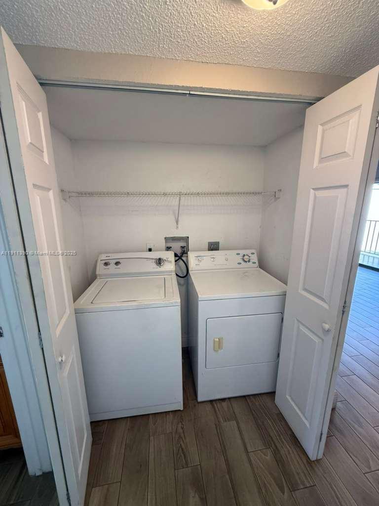 1580 Windorah Way, Unit E West Palm Beach, FL 33411 - Photo 20 of 20 a utility room with dryer and washer