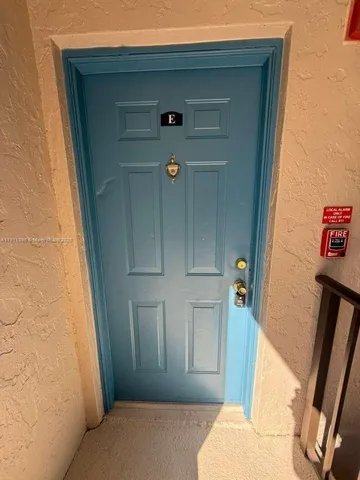 a view of front door and stairs