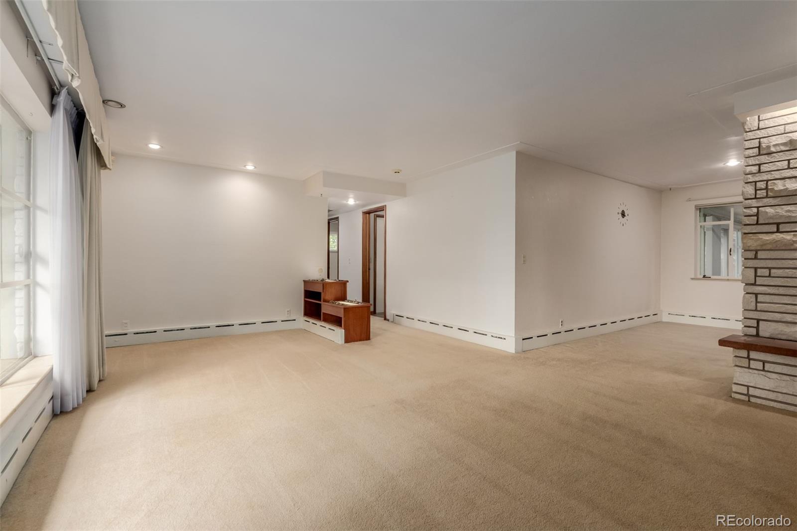 3880 Independence Court Wheat Ridge, CO 80033 - Photo 14 of 47 an empty room with windows