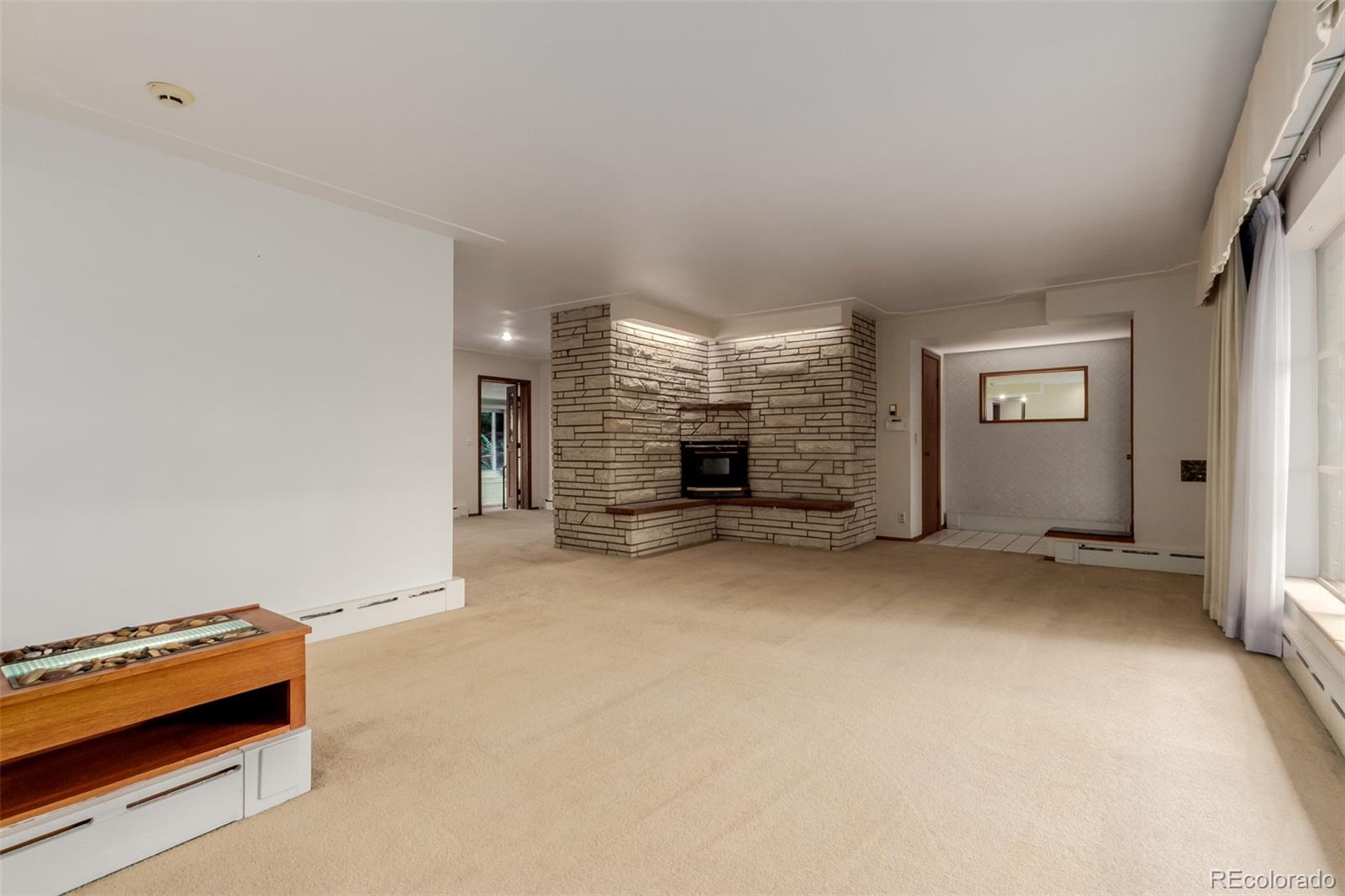 3880 Independence Court Wheat Ridge, CO 80033 - Photo 15 of 47 an empty room with windows