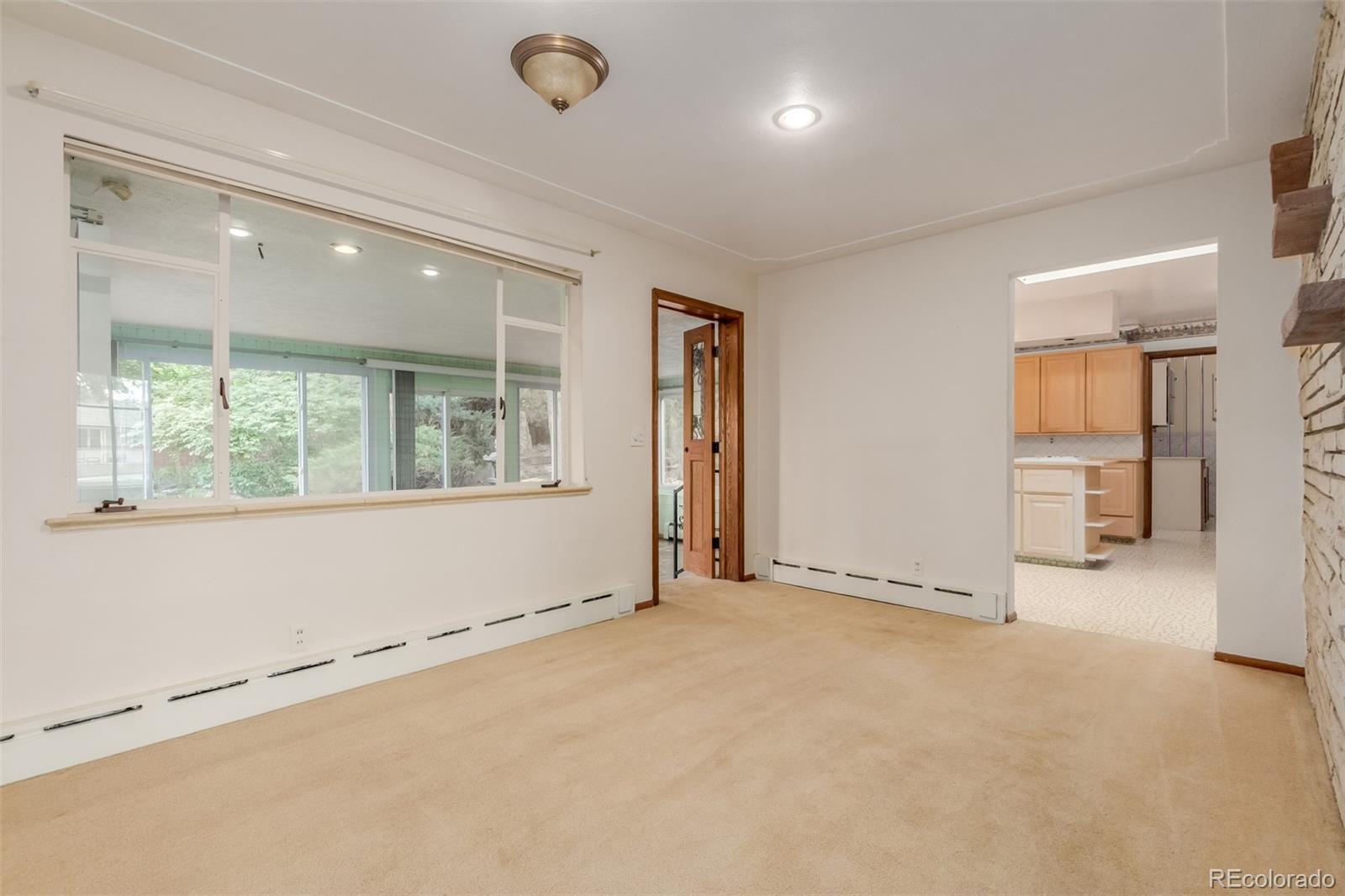 3880 Independence Court Wheat Ridge, CO 80033 - Photo 18 of 47 an empty room with windows