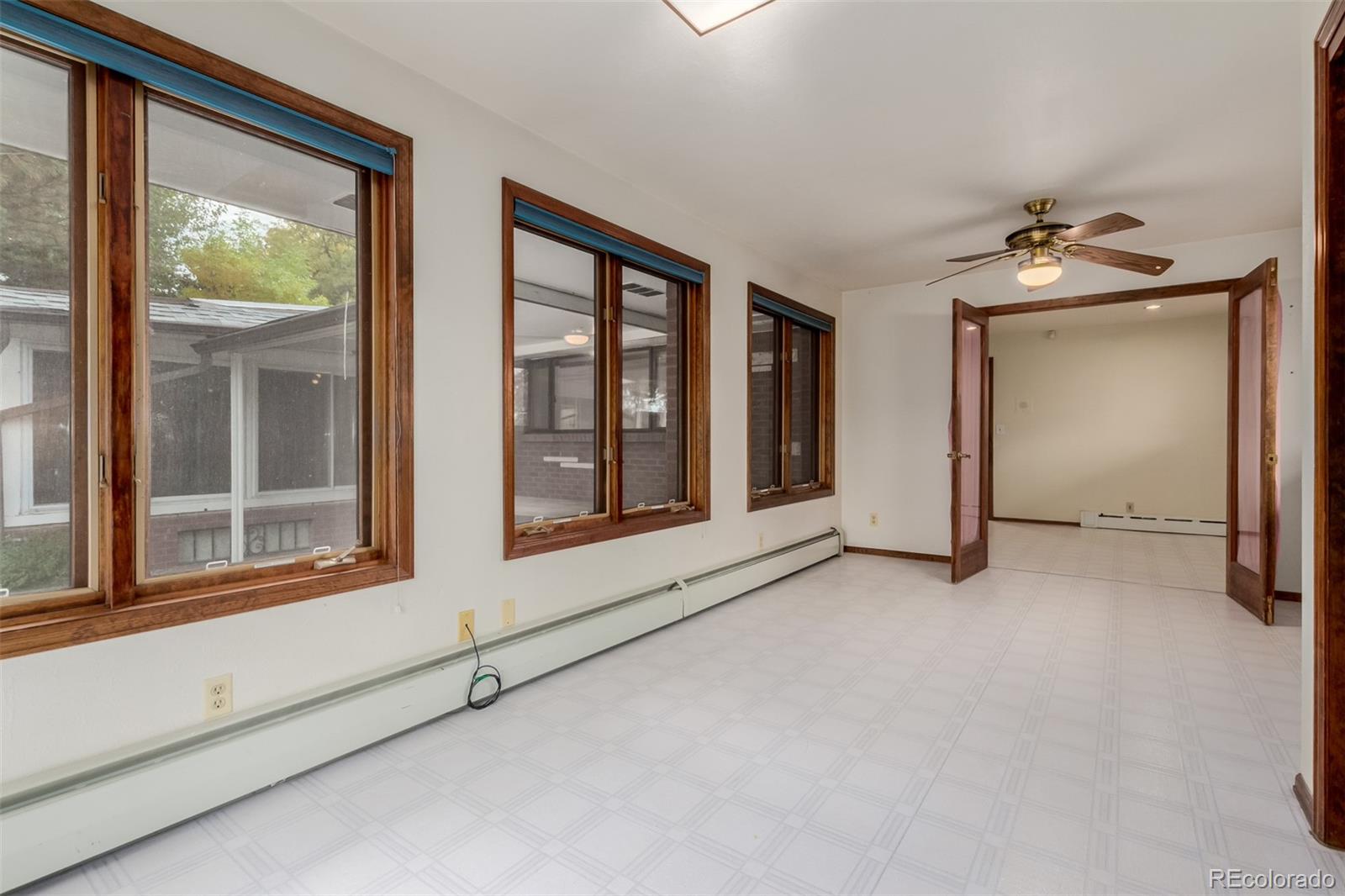 3880 Independence Court Wheat Ridge, CO 80033 - Photo 37 of 47 a view of an empty room with a window
