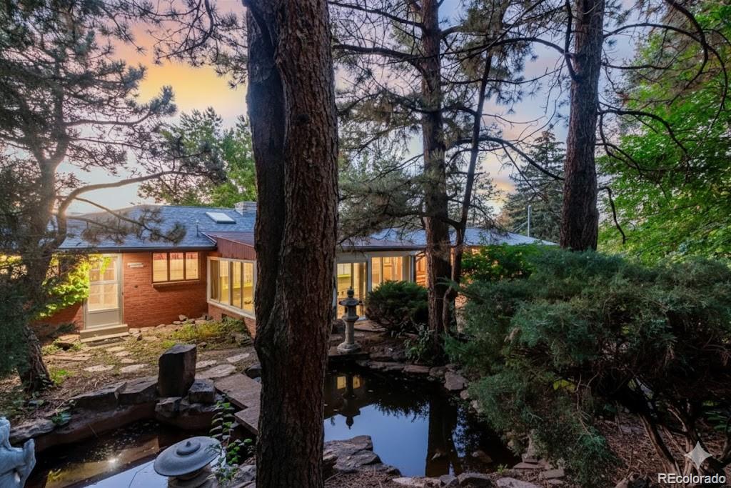 3880 Independence Court Wheat Ridge, CO 80033 - Photo 41 of 47 a backyard of a house with lots of green space