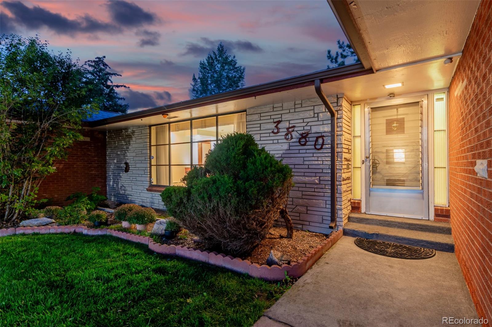 3880 Independence Court Wheat Ridge, CO 80033 - Photo 7 of 47 a backyard of a house with lots of green space