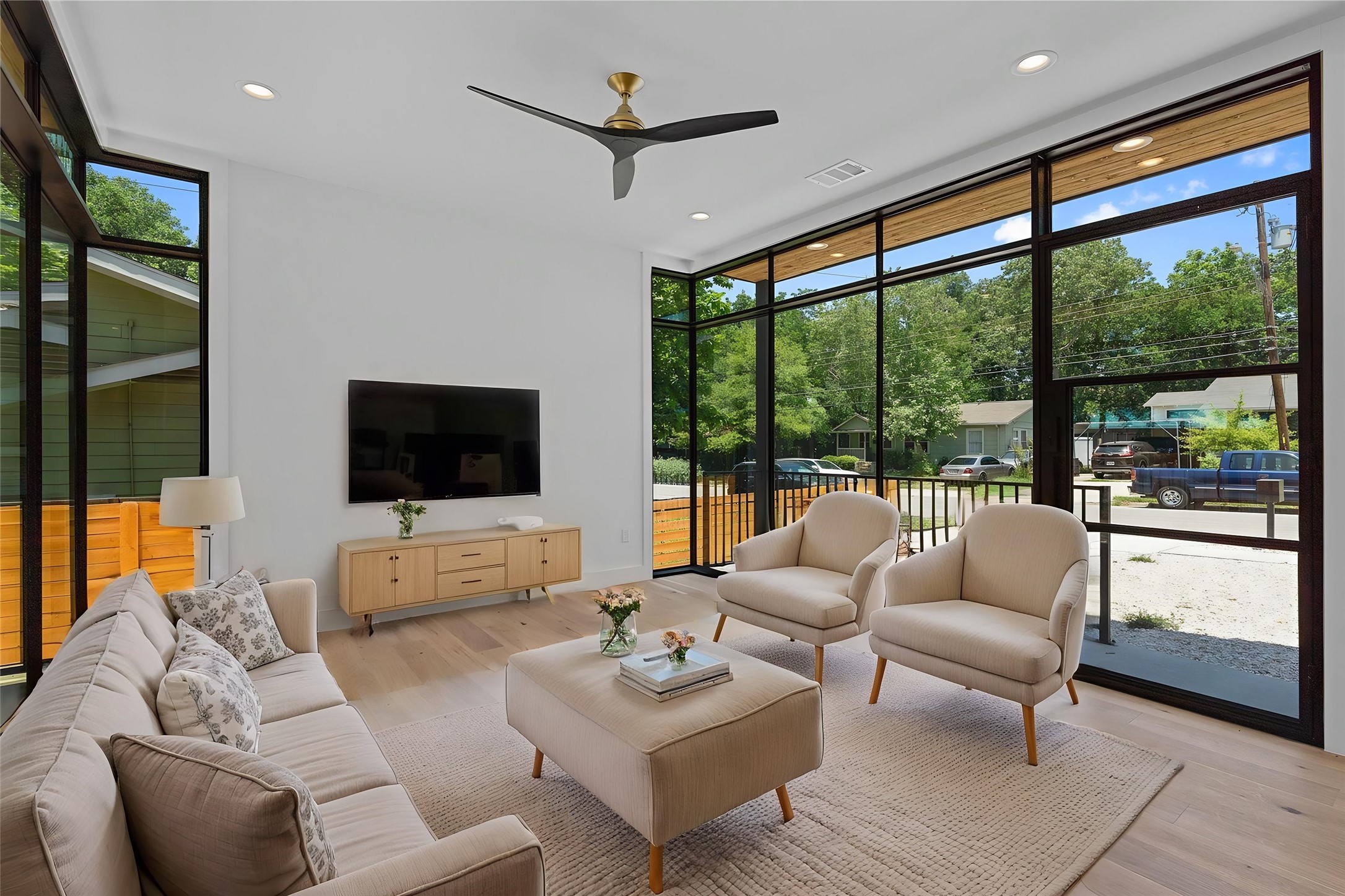 909 Payne Avenue, Unit 1 Austin, TX 78757 - Photo 13 of 38 Virtually Staged Living Room - Blinds have since been installed for privacy.