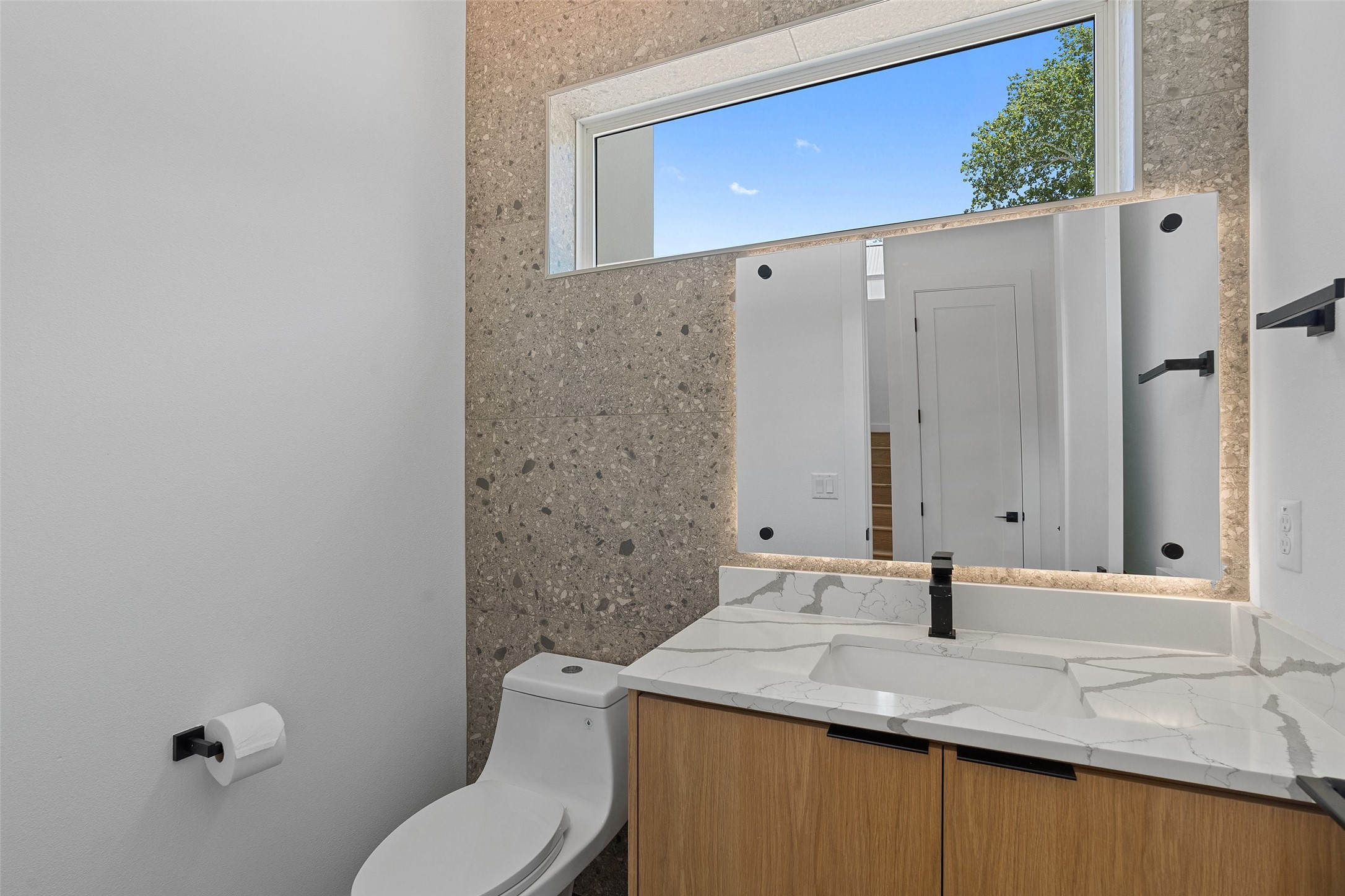 909 Payne Avenue, Unit 1 Austin, TX 78757 - Photo 17 of 38 Downstairs half bath!