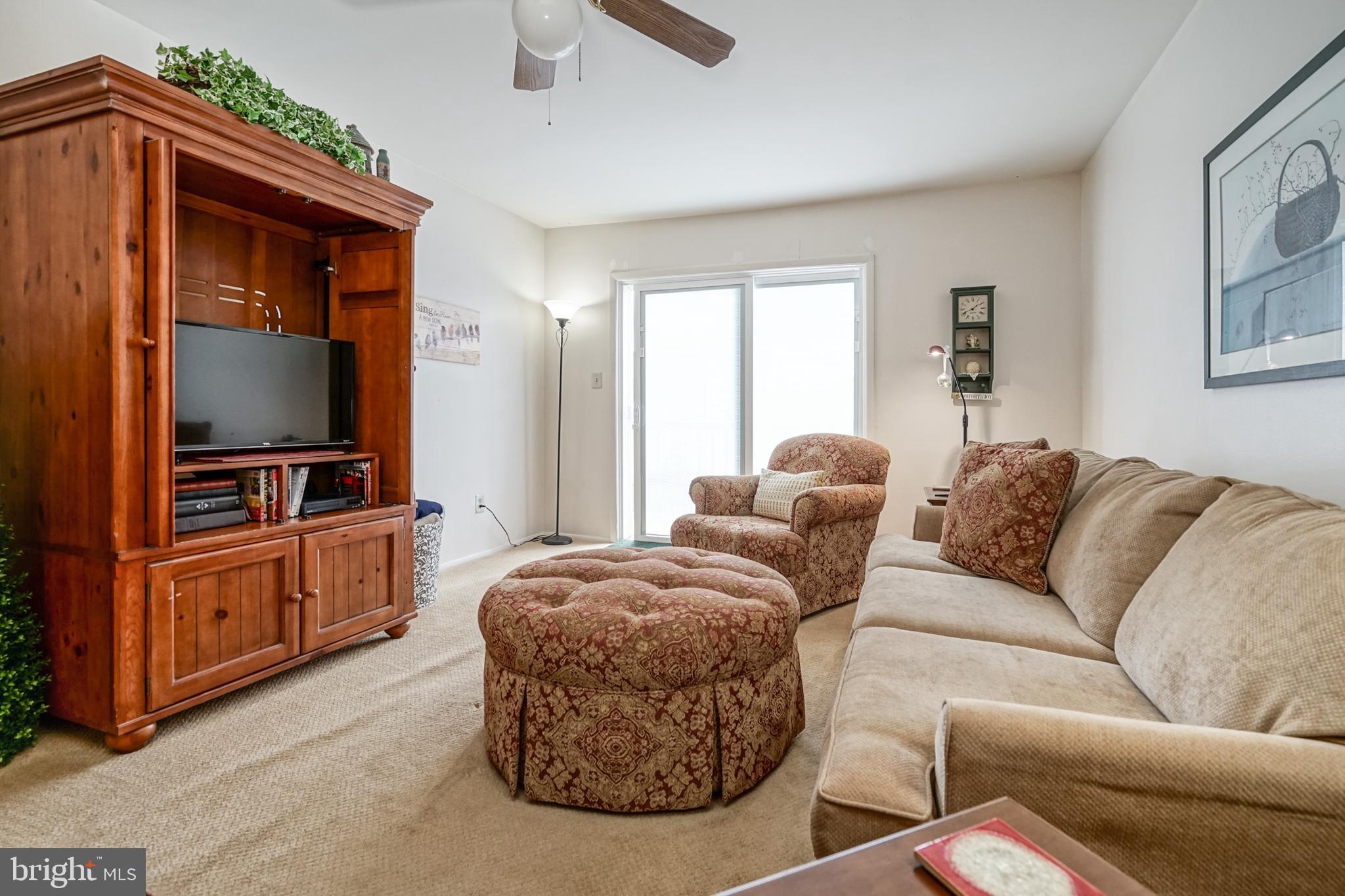 809 Woodchip Road Lumberton, NJ 08048 - Photo 3 of 24 Living Room with Newer Sliding Glass Door .