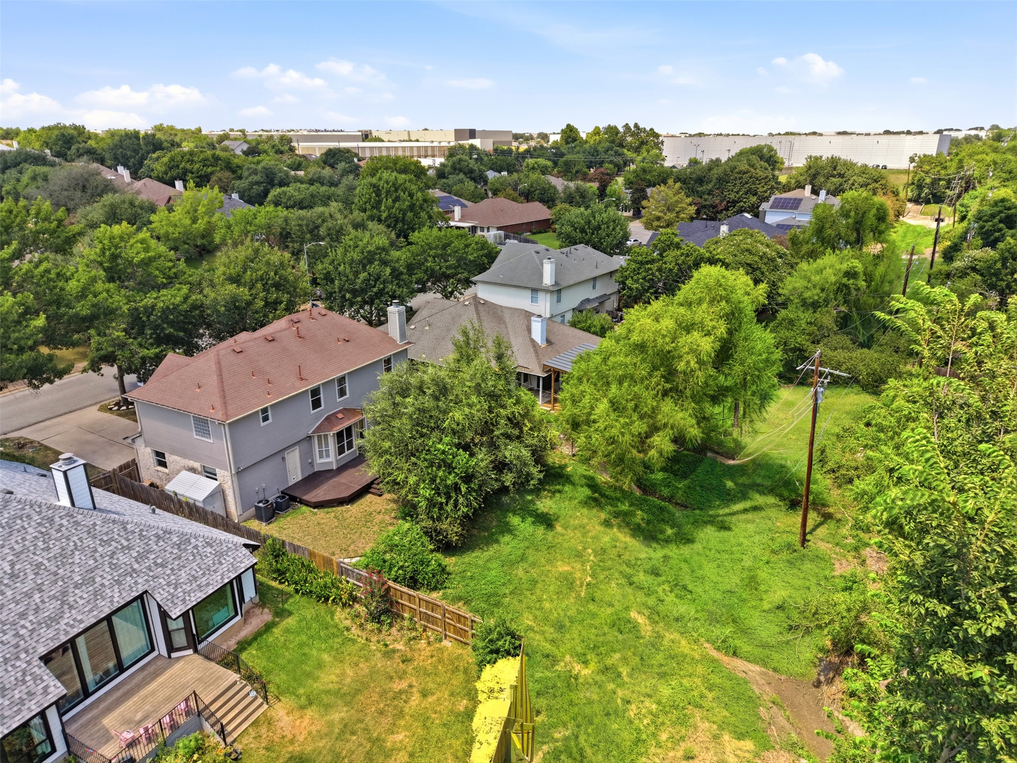 15207 Natural Spring Way Austin, TX 78728 - Photo 35 of 40 The aerial view of the backyard shows the space in your yard beyond the fence line.