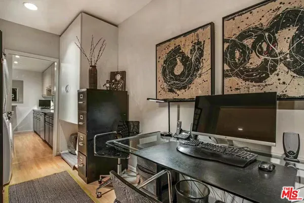 a room with furniture and flat screen tv