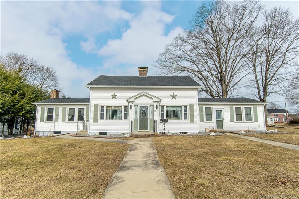 64 Winter Street Killingly, CT 06239 - Photo 1 of 1 a front view of a house with a garden